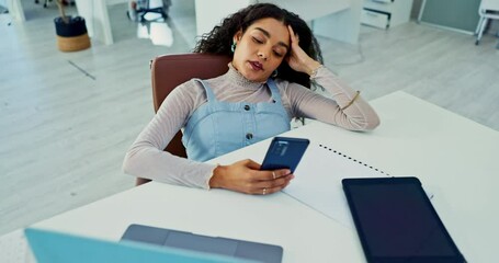 Poster - Laptop, phone and bored with business woman at desk in office with fatigue or exhaustion from work. Computer, burnout or social media distraction with app and frustrated young employee in workplace