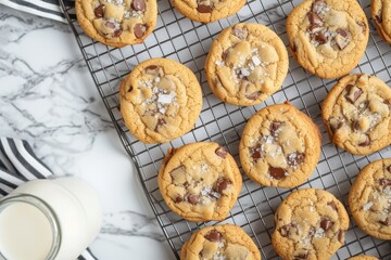 Wall Mural - Chocolate chip cookies with flaky salt served with cold milk resting on a cooling rack