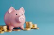 © tonstock - Secure your financial future by feeding the pink piggy bank and watching your gold coin stack grow on a vibrant blue backdrop.