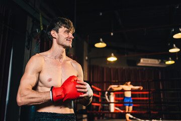 Wall Mural - Active, athletes and fit men kick boxing and doing sport training workout in a gym. Two male partners or MMA boxer and trainer practice sparring exercises for a healthy wellness lifestyle.