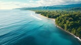 Fototapeta Natura - Aerial view of ocean and beach on tropical island. Summer vacation holiday background. Seascape