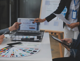 Close up ux developer and ui designer use augmented reality brainstorming about mobile app interface wireframe design on desk at modern office.Creative digital development agency