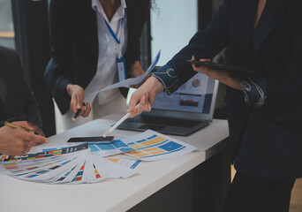 Close up ux developer and ui designer use augmented reality brainstorming about mobile app interface wireframe design on desk at modern office.Creative digital development agency