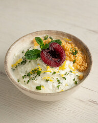 Wall Mural - Yogurt and lemon mousse with cherries.