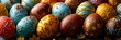 A collection of vibrant Easter eggs rest inside a basket