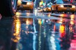 taxi tires on shiny wet street with lights