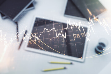 Poster - Double exposure of abstract creative financial diagram and modern digital tablet on background, banking and accounting concept