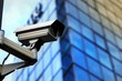 © ADDICTIVE STOCK - Modern security camera on a building exterior Generative AI image