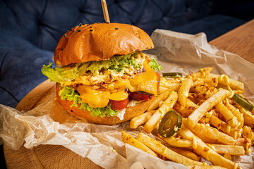 Wall Mural - burger with french fries closeup