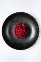 Canvas Print - beetroot salad on black plate