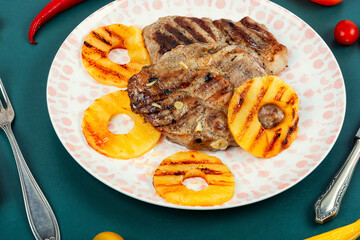 Poster - Grilled meat steak with pineapple.