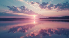 Soft Clouds In Shades Of Pink And Lavender Are Mirrored In The Still Waters Of The Lake Creating A Picturesque Sunset Scene.