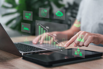 Green business plan, Globe reducing carbon concept, Businesswoman show graph target carbon global warming, Climate neutral long term strategy. Decarbonization, Greenhouse gas emission target