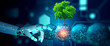 Robot hand pointing a digital ball with tree against nature with digital convergence and technology background. Ecology, Energy, Environment, Green Technology, and IT ethics Concept.