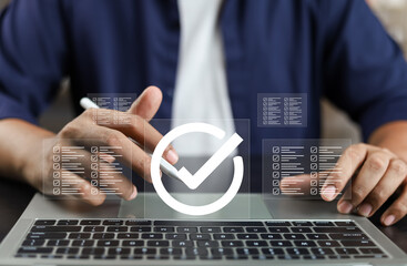 Canvas Print - Digital business performance monitoring survey filling with tablet and laptop, Businessman enhancing business performance with comprehensive online survey checklist, Technology in education learning.