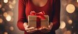 Top view cozy female opening craft festive gift box full of beauty products for skin body face care Closeup cute woman in warm knitted pullover celebrating winter holiday Christmas presents