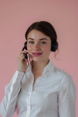 Poster - A woman in a white shirt talking on a cell phone. This image can be used to depict communication, technology, or modern lifestyle
