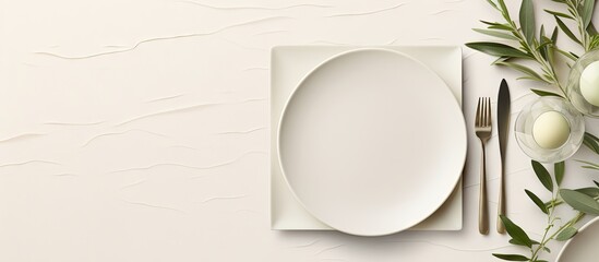 Aufkleber - Wedding Table place with invitation card and porcelain plates decorated with olive branches top view Elegant modern template with vertical blank paper card flat lay Mediterranean mockup copy sp