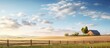 Wooden fence with open field and barn in distance. Creative Banner. Copyspace image