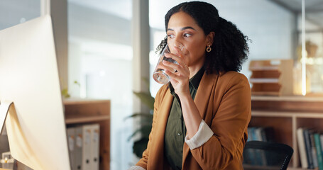 Poster - Woman at desk with computer, drinking water and typing email, report or article at digital agency. Internet, research and happy businesswoman at tech startup with glass, networking or project at work