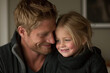 © Tanya - Happy young blond father and daughter in black clothes. Father's day concept.