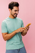 © SHOTPRIME STUDIO - Phone man mobile holding happy lifestyle message portrait smartphone communication background cyberspace smile blogging