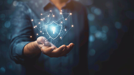 Canvas Print - professional in a suit with an illuminated shield icon hovering above his open hands.