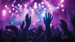 © MP Studio - lively crowd at a concert, with hands raised in the air, silhouetted against a backdrop of vibrant stage lights, capturing the energy and excitement of a live music event.