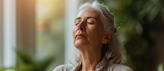 Wall Mural - Beautiful young woman with striking white hair and wearing a white shirt gazing up at the serene sky