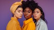 © Werckmeister - Portrait of three different nation women asian african-american and caucasian are brought together with diverse type on skin. Isolated on purple background