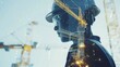 © MdKamrul - Double exposure construction engineer working with modern technology.