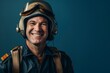 Smiling vintage pilot with helmet on blue background. Retro and vintage aviation concept. Travel and exploration. Design for banner, poster with copy space