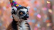a close up of a lemura wearing a party hat with confetti on it's head.