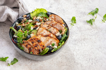 Wall Mural - Grilled chicken breast and fresh vegetable salad. Fresh healthy food.
