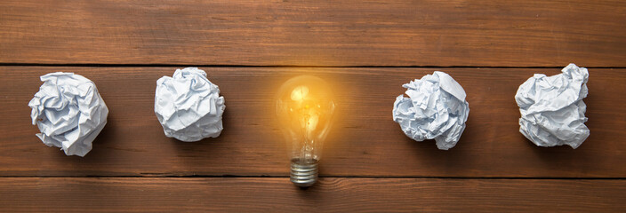 Wall Mural - light bulb  with papers