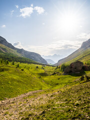 Wall Mural - Summer sunlight in the alpine valley