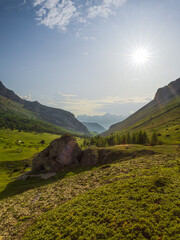 Wall Mural - Summer sunlight in the alpine valley