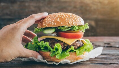 Wall Mural - hand taking a big burger