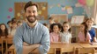 © Farid - A smiling male teacher, with happy students in the background.