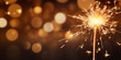 © Teerasak - Radiant New Year: Sparkler Igniting with Shimmering Sparks Against a Festive Silvester Party Background