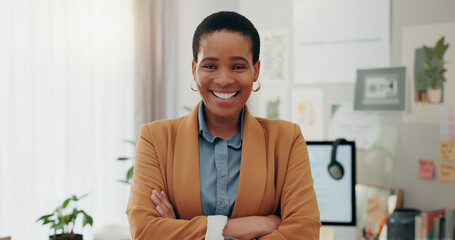 Wall Mural - Remote work, confidence and black woman at desk with computer, headphones and smile in home office. Freelance, internet and technology, online career with happy virtual assistant working in apartment