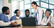 © peopleimages.com - Healthcare, meeting and doctors, nurses and laptop in office with documents for medical compliance, surgery or planning. Hospital, team or people online for brainstorming, solution or problem solving