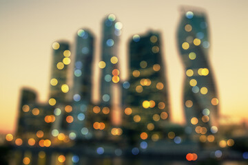 Poster - Blurry bokeh lights city wallpaper. Skyline and landing page concept.
