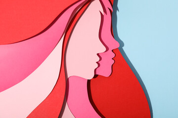 Wall Mural - Paper female head on a light background