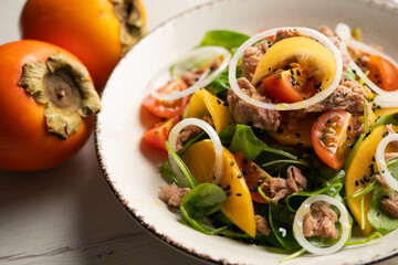 Poster - Persimmon, tomato, onion and tuna salad.