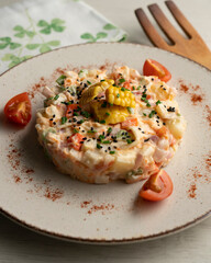 Canvas Print - Traditional Russian salad with mayonnaise and corn.