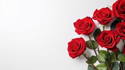 Wall Mural - composition of a bouquet of red roses flowers, top view with copy space on a white background