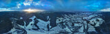 Fototapeta Na ścianę - Lot nad Tyliczem o zachodzie słońca zimą. Zimowy krajobraz.