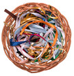 Wicker basket with colorful ribbons on a transparent background.