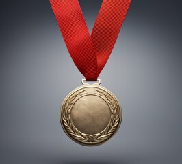 Golden medal with red ribbon isolated on white background